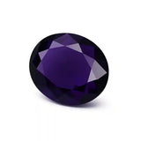 Faceted purple gemstone on a white background