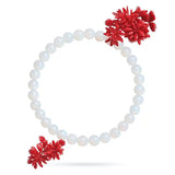 White beaded bracelet with red floral ends on a white background