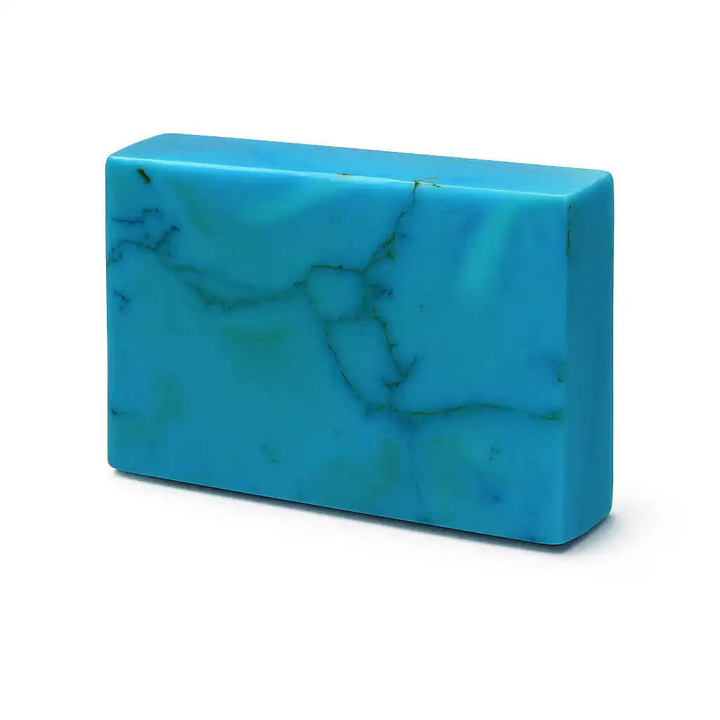 Blue yoga block with marble pattern on a white background